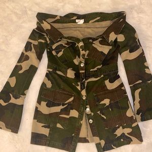 Camouflage dress from mistress rocks. Model is wearing a size medium. No stretch